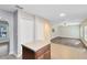 Kitchen features wood cabinets and an island at 1624 Valmont Ln, Apopka, FL 32703
