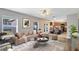 Open concept living and dining area with kitchen access at 1624 Valmont Ln, Apopka, FL 32703