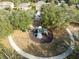 Community playground with playset, benches, and walking path at 1624 Valmont Ln, Apopka, FL 32703
