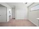 Spacious hallway with plush carpet and access to bedrooms at 175 Claffey Ct, Haines City, FL 33844