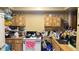 Small condo kitchen with wood cabinets and appliances at 197 Scottsdale Sq # 197, Winter Park, FL 32792