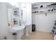 Bathroom with double vanity and built-in shelving at 2212 Orange Center Blvd, Orlando, FL 32805