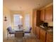 Breakfast nook with glass table and chairs at 2530 Saffron Ln, The Villages, FL 32162