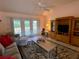 Bright living room with access to backyard patio at 2530 Saffron Ln, The Villages, FL 32162