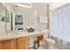 Guest bathroom with single sink vanity and shower/tub combo at 2740 Coupe St, Kissimmee, FL 34746
