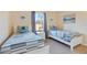 Bedroom with two twin beds and large window at 2740 Coupe St, Kissimmee, FL 34746