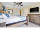 Spacious main bedroom with king-size bed and ensuite bathroom at 2740 Coupe St, Kissimmee, FL 34746