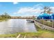 Serene lake view with a dock at 2740 Coupe St, Kissimmee, FL 34746