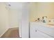 Upper-level laundry room with washer and dryer at 2740 Coupe St, Kissimmee, FL 34746
