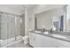 Bathroom features double vanity and walk-in shower at 2748 Bookmark Dr, Kissimmee, FL 34746