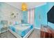 Charming bedroom with Frozen theme, featuring a comfortable bed and large TV at 2748 Bookmark Dr, Kissimmee, FL 34746