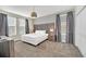 Main bedroom with king-size bed and modern decor at 2748 Bookmark Dr, Kissimmee, FL 34746
