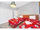 ' bedroom with twin beds, Mickey Mouse bedding and decor at 2748 Bookmark Dr, Kissimmee, FL 34746