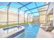 Enclosed pool and spa with lounge chairs, perfect for relaxation at 2748 Bookmark Dr, Kissimmee, FL 34746