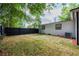 Backyard features a fenced perimeter and grass for recreation at 2803 E Pine St, Orlando, FL 32803