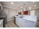 Modern kitchen with marble island and stainless steel appliances at 2803 E Pine St, Orlando, FL 32803