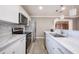 Updated kitchen featuring marble countertops and stylish pendant lighting at 2803 E Pine St, Orlando, FL 32803