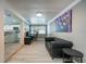 Bright home office with open layout and view of the kitchen at 2803 E Pine St, Orlando, FL 32803