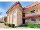 Inviting exterior showcasing the home's unique architectural details and a well-manicured landscape at 2868 N Powers Dr # 5, Orlando, FL 32818