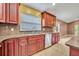 Kitchen with stainless steel appliances and wood cabinets at 3136 Crystal Creek Blvd, Orlando, FL 32837