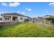 Large backyard with a pool and stone patio at 4032 Prairie Reserve Blvd, Orlando, FL 32824