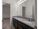Bathroom with double vanity and granite countertop at 4032 Prairie Reserve Blvd, Orlando, FL 32824
