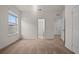 Spacious bedroom with access to hallway and bathroom at 4032 Prairie Reserve Blvd, Orlando, FL 32824