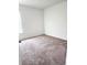 Bright bedroom featuring neutral walls and carpet at 4032 Prairie Reserve Blvd, Orlando, FL 32824