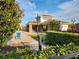 Community pool area with lounge chairs and a covered pavilion at 4032 Prairie Reserve Blvd, Orlando, FL 32824