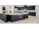 Large kitchen with granite countertop island at 4032 Prairie Reserve Blvd, Orlando, FL 32824