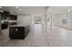 Open kitchen with large island and dark cabinetry at 4032 Prairie Reserve Blvd, Orlando, FL 32824