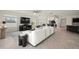 Bright living room with tile floors, a ceiling fan, and a television at 4032 Prairie Reserve Blvd, Orlando, FL 32824