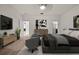 A lovely main bedroom featuring two doorways, neutral walls, carpet and a modern design at 4032 Prairie Reserve Blvd, Orlando, FL 32824
