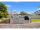Outdoor kitchen with grill and granite countertop at 4032 Prairie Reserve Blvd, Orlando, FL 32824