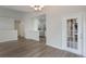 Dining area with access to balcony and kitchen at 5436 E Michigan St # 4, Orlando, FL 32812