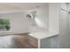 View of hallway with access to laundry closet and living areas at 5436 E Michigan St # 4, Orlando, FL 32812