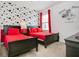 Mickey Mouse themed bedroom with two twin beds and red bedding at 6112 Broad Oak Dr, Davenport, FL 33837