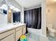 Simple bathroom featuring a bathtub and shower at 7350 Westpointe Blvd # 224, Orlando, FL 32835