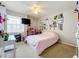 Cozy bedroom with a double bed and plenty of wall art at 7350 Westpointe Blvd # 224, Orlando, FL 32835