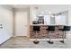 Kitchen with breakfast bar and brick accent wall at 7350 Westpointe Blvd # 224, Orlando, FL 32835