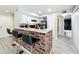Bright kitchen with stainless steel appliances and breakfast bar at 7350 Westpointe Blvd # 224, Orlando, FL 32835