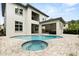 Exterior of home showcasing pool and outdoor living space at 7399 Gathering Ct, Reunion, FL 34747