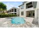 Home exterior showcasing a swimming pool and outdoor living space at 7399 Gathering Ct, Reunion, FL 34747