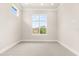 Bright bedroom with a large window allowing ample natural light to flow in at 7399 Gathering Ct, Reunion, FL 34747