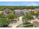 Stunning two-story home with a well-manicured lawn and beautiful landscaping at 7399 Gathering Ct, Reunion, FL 34747