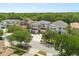 Beautiful two-story home featuring a manicured lawn and picturesque neighborhood at 7399 Gathering Ct, Reunion, FL 34747
