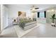 Virtually staged bedroom featuring a neutral color scheme, ceiling fan, and a large closet at 744 London Rd, Winter Park, FL 32792