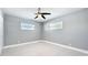 Bright bedroom with ceiling fan and neutral walls at 744 London Rd, Winter Park, FL 32792