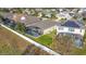 Aerial view of neighborhood with community pool and homes at 8030 King Palm Cir, Kissimmee, FL 34747