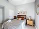 Bright bedroom with wood accents and neutral tones at 8030 King Palm Cir, Kissimmee, FL 34747